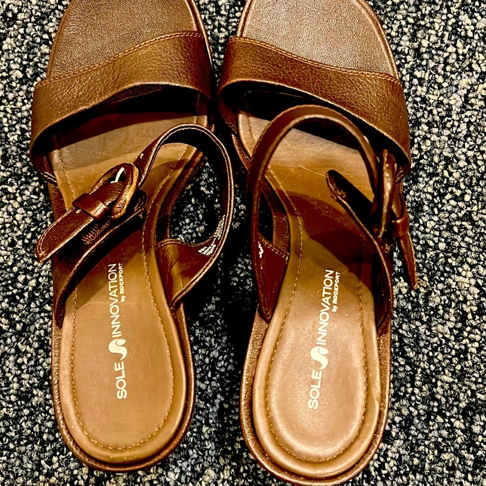 Brown slip on sandals by Rockport